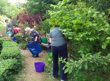 Members of the committee tidying up.